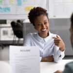 A job seeker smiling during her interview
