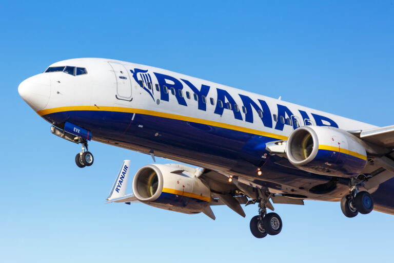 a ryanair plane flying in the sky