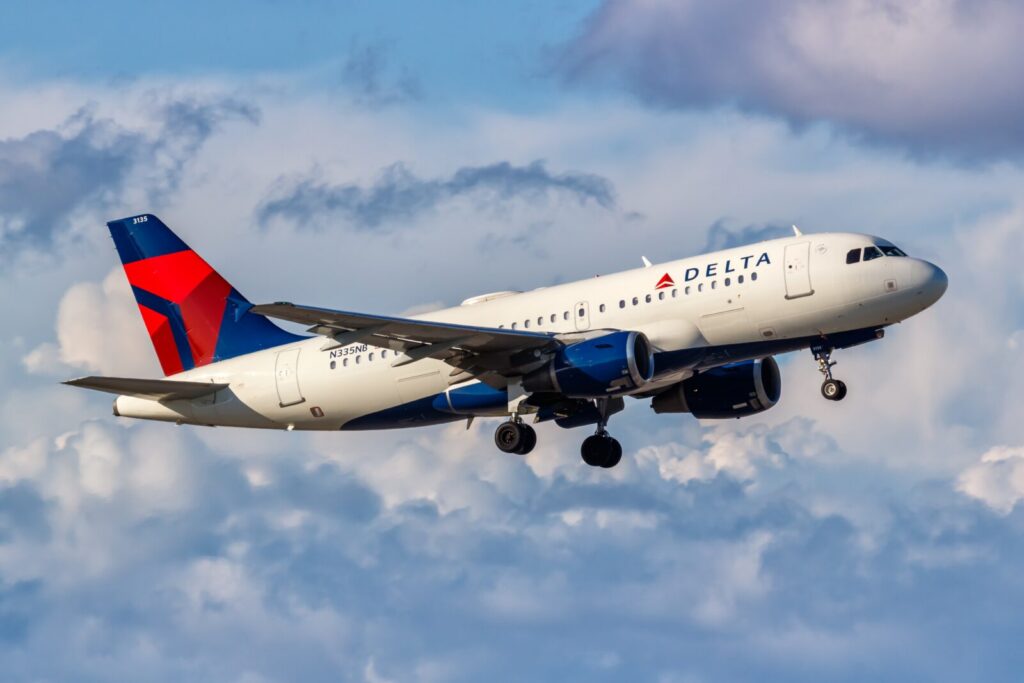 a delta air lines airbus a319 in the sky
