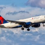 a delta air lines airbus a319 in the sky