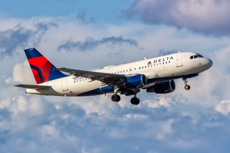 a delta air lines airbus a319 in the sky