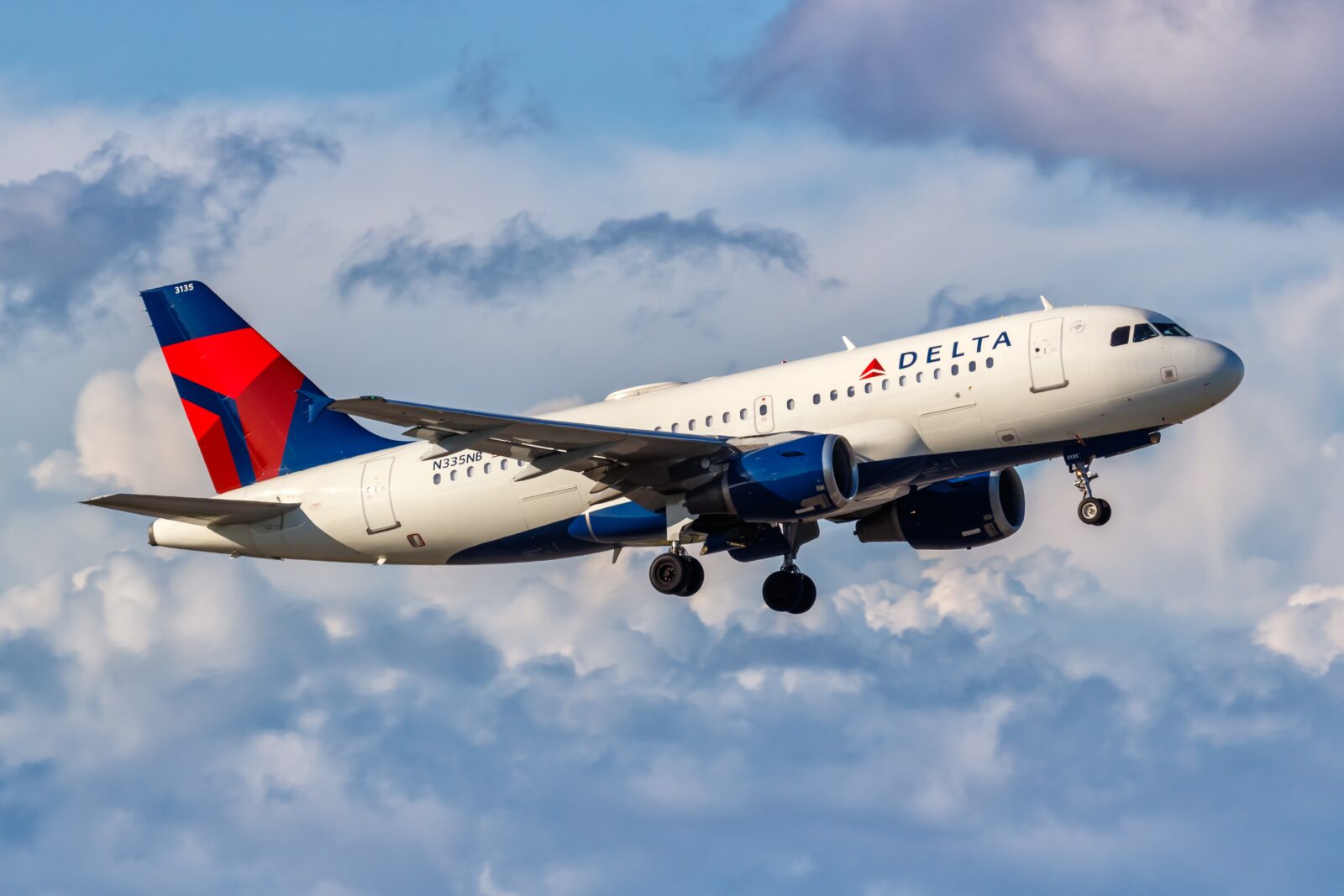a delta air lines airbus a319 in the sky