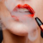 a woman vaping