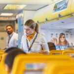 ryanair cabin crew serving passengers