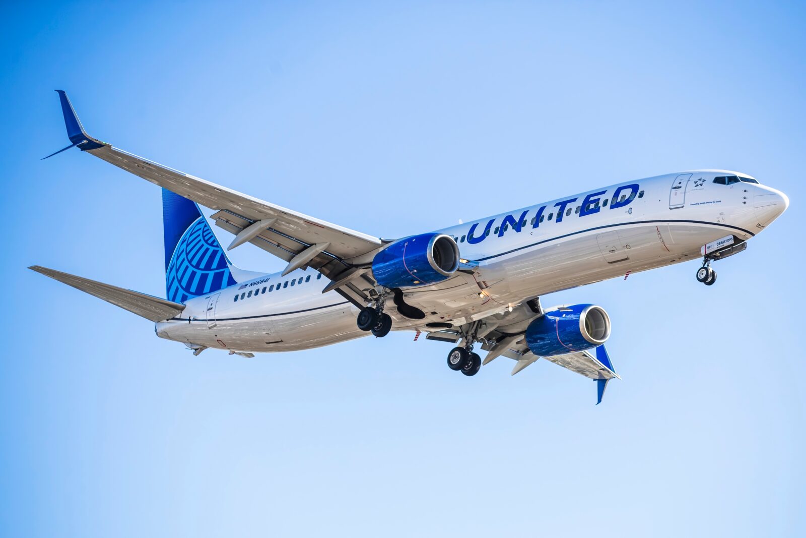 a united airline plane in the sky